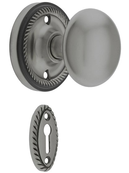Rope Rosette Mortise Lock Set With Round Brass Knobs in Antique Pewter finish.